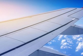 Prev�n baja de 4% en precios de pasajes a�reos